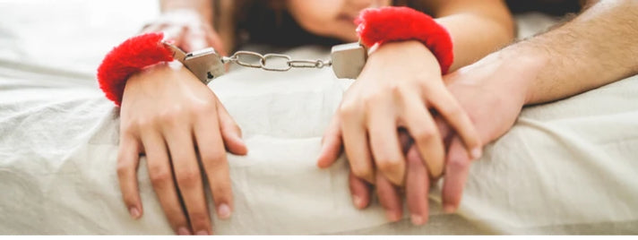 Handcuffs and the Freedom They Give: A Playful Paradox