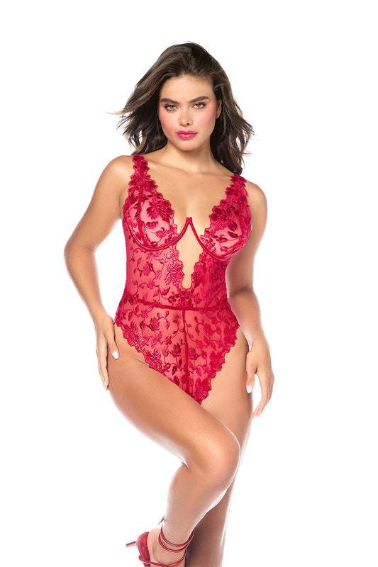 An opulent take on a classic silhouette. This extravagant teddy features monochrome embroi