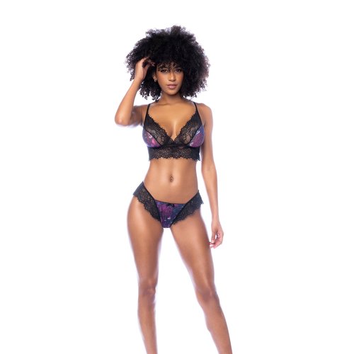 Emerging from a secret garden among lush flowers. Two-piece set in printed mesh with eyela