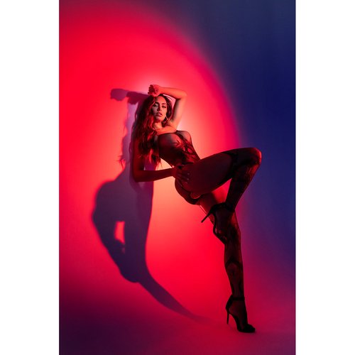 Surrender to your wildest impulses in this Snake Fishnet Bodystocking, adorned w